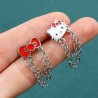 HELLO KITTY Boucle d'oreille kitty asymetrique theme rouge